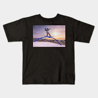 Snowboarder sliding on a rail Kids T-Shirt